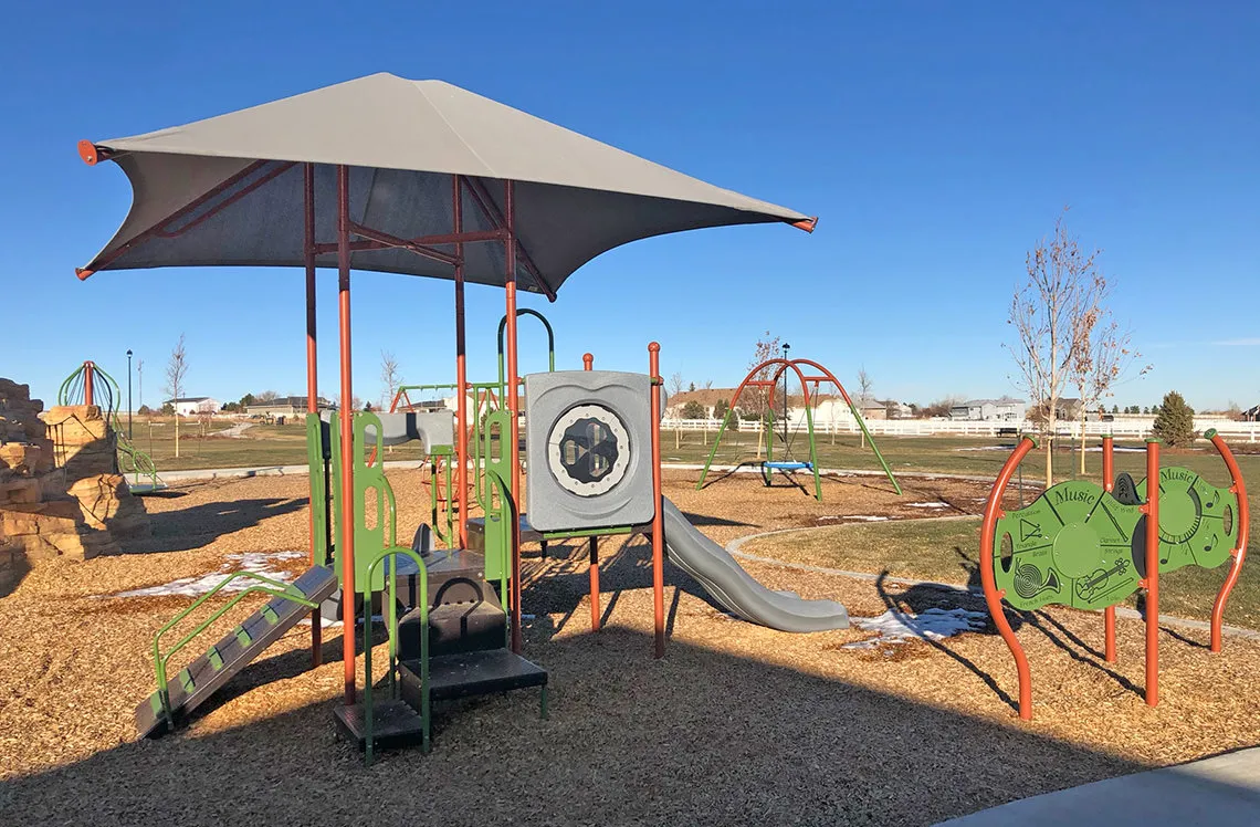 Mini slide and play structure. Talon Point at Todd Creek